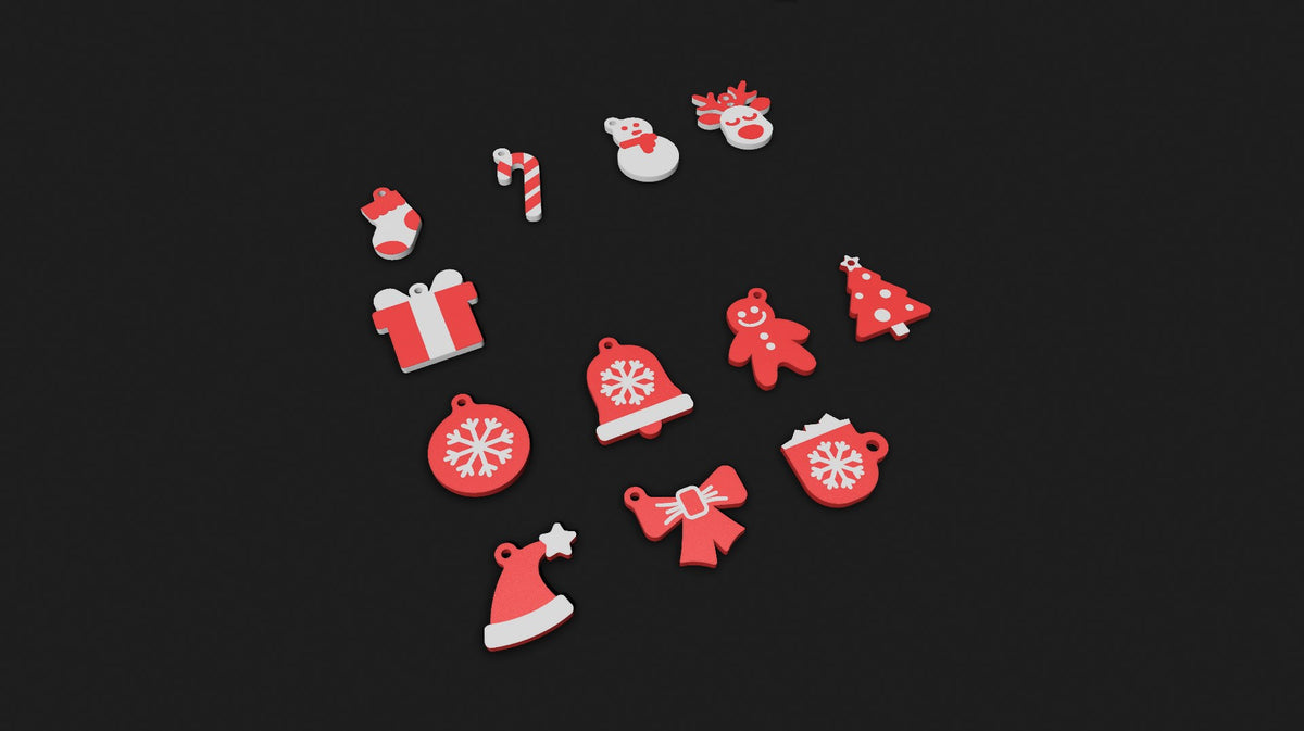 Zwölf Schlüsselanhänger mit Weihnachtsmotiven