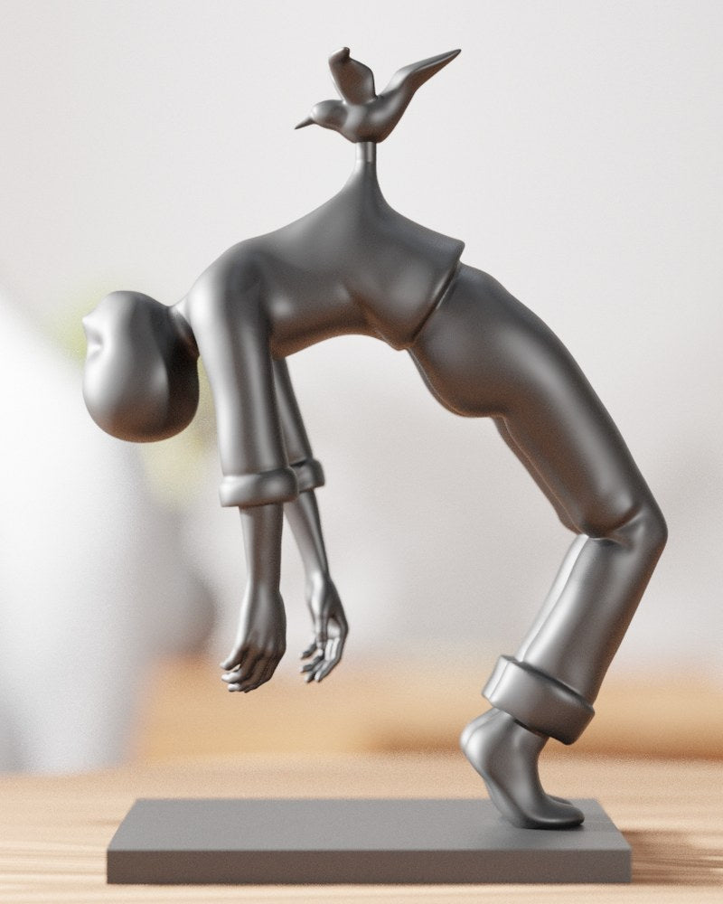 Close-up of Bird of Burden surreal sculpture figurine showing faceless figure arched backward with bird on spine