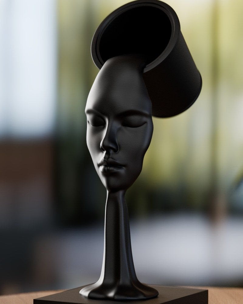 Abstract surreal sculpture of a face emerging from flowing form, photographed on white background