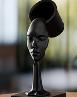Abstract surreal sculpture of a face emerging from flowing form, photographed on white background