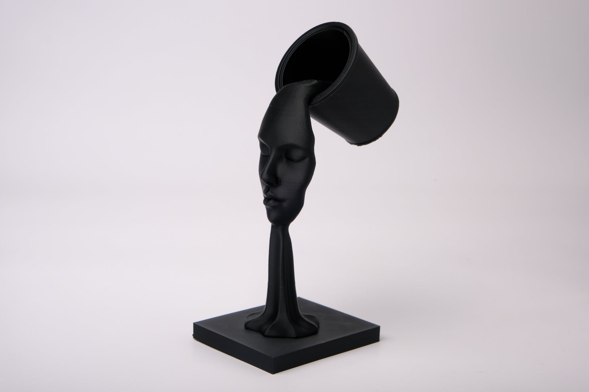 Ethereal Flow abstract surreal sculpture styled on a minimalist shelf with neutral decor