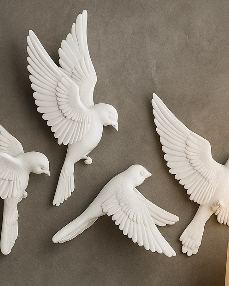 White bird wall sculpture set in matte finish, three birds mid-flight against white background