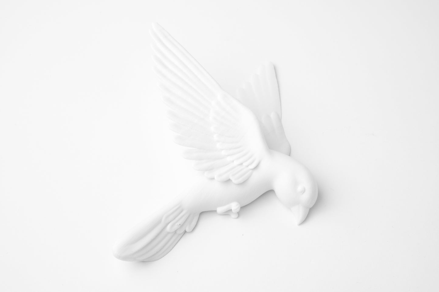 White bird wall sculpture set in matte finish, three birds mid-flight against white background