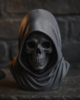 Gothic skull bust with hooded drapery, grinning skull face, matte finish, front view on neutral background