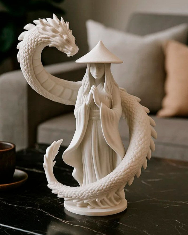 Dragon guardian sculpture close-up — robed figure with coiling dragon, matte white finish