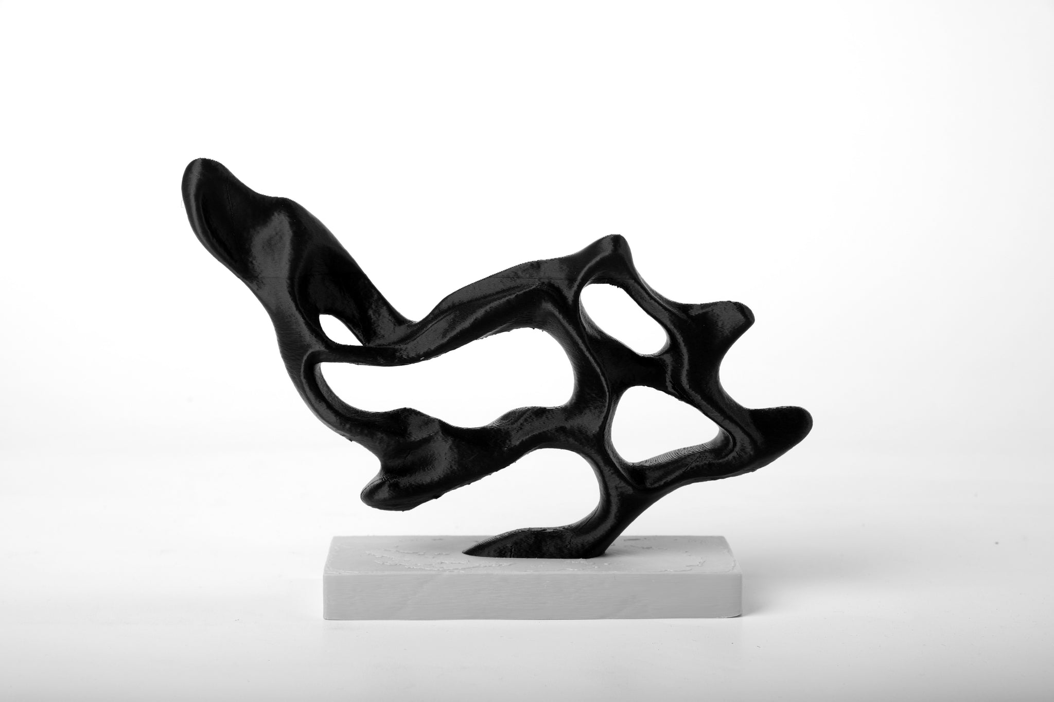 Flow Structure abstract sculpture styled on a minimal shelf with neutral decor and soft natural light