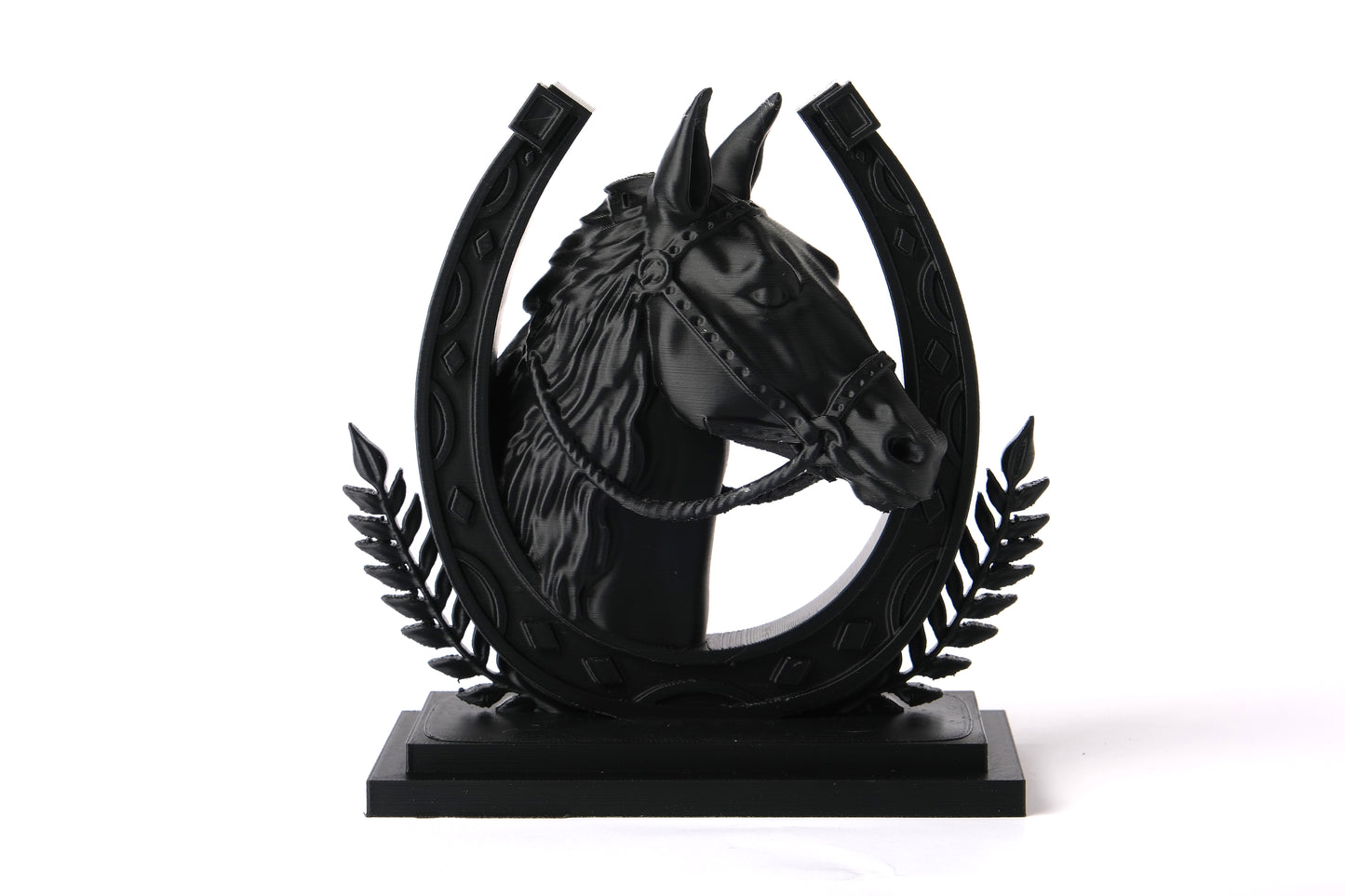 Horse sculpture styled on a wooden shelf with natural decor objects and soft light