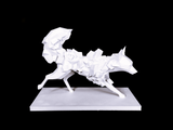 Detail shot of the sharp angular facets on a low poly fox figurine in a neutral interior