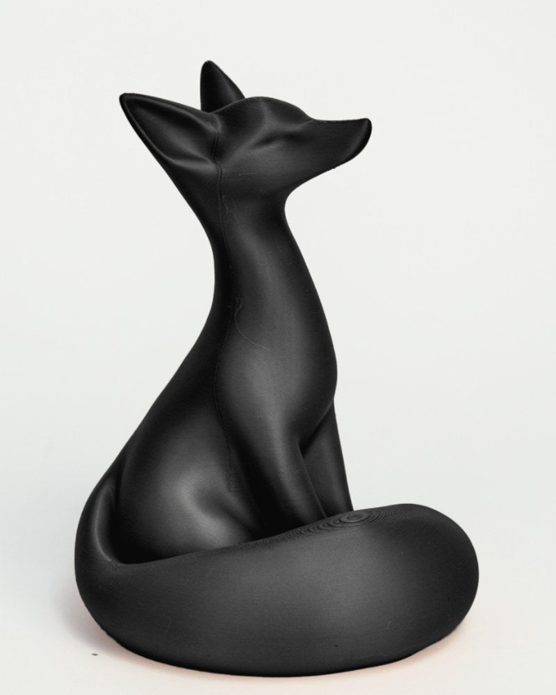 Close-up of Nocturne Fox sculpture showing clean minimalist form and matte surface texture
