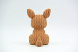 Macro detail of the crochet-look surface texture on a knitted kangaroo figurine, showing soft looped pattern