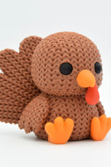 Close-up of a knitted turkey decoration with textured woven surface and fanned tail feathers, 49 DKK