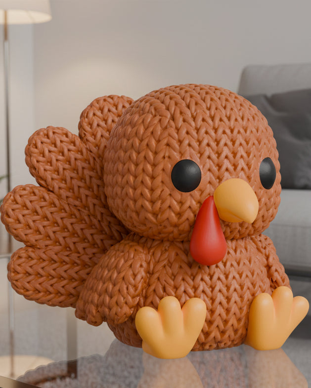 Close-up of a knitted turkey decoration with textured woven surface and fanned tail feathers, 49 DKK