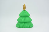 Texture detail of the knitted Christmas tree surface showing the soft woven pattern and layered tiers