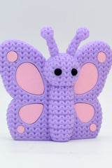 Close-up of a knitted butterfly decoration with crochet-texture wings in warm tones, 49 DKK