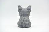 Texture detail of the knitted French Bulldog surface showing the soft, looped pattern that mimics handmade crochet