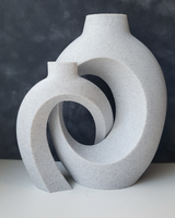 Detail shot of the toroidal woven surface of a nordic vase showing the open weave pattern