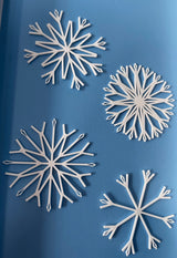 Set mit 4 Schneeflocken zum Aufhängen