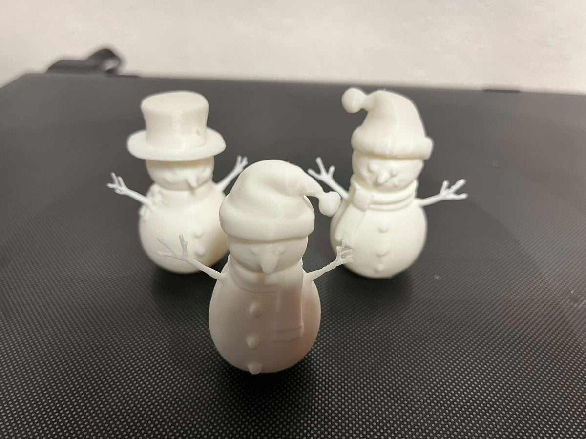 Set mit 3 süßen Schneemannfiguren